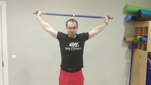 Циркумдукция с палкой стоя