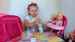 Кукла БЕБИ БОРН плачет, растет первый зубик  Чистим зубки #бебибонЭмили УХОД ЗА МАЛЫШОМ