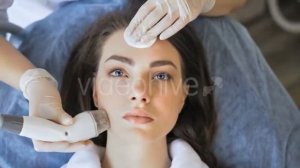 Young Woman Getting Radio Frequency Lifting Procedure in a Beauty Salon | Stock Footage - Videohive