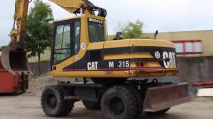 Caterpillar M315 mobile excavator demonstration