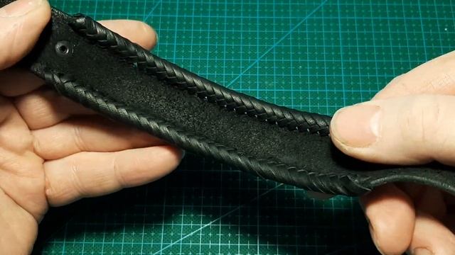 Оригинальный кожаный плетеный браслет.