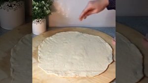 Слоеный хинкал с сушенной колбасой.