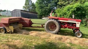 First cut 2020 cutting hay and baling with a new holland 316 sperry baler