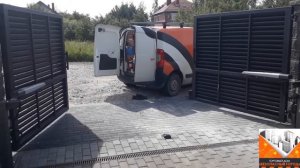 Установка автоматики на зашитые деревянными элементами распашные ворота
