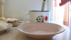 Перец фаршированный в сметанном соусе