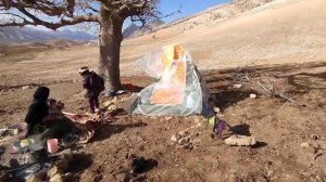 Nomadic mother's fervent resistance from her children under the rain: nomadic life in Iran