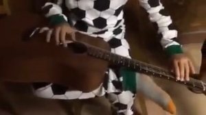 Autistic Boy Plays Robert Johnson Blues (Me & the Devil Blues)