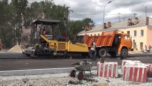 Укладка асфальта на автотрассу, строительство дорог