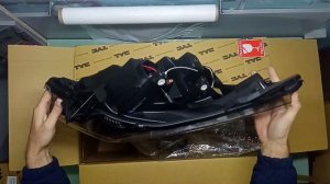 Фара черная OPEL ASTRA H 2004 2007 HB (TYC)