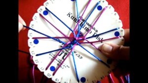 Плетеный браслет Кумихимо.