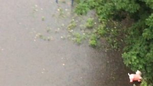 На улице Белинского залило детскую площадку и парковку