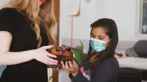 Simple device helps determined young violinist