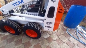 ???видеообзор минипогрузчика бобкет 315 тсм из Японии.