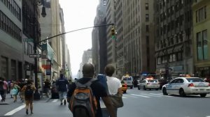 (Stabilized) NYPD officers shoot man waving butcher's knife on Times Square