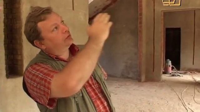 Двухэтажный кирпичный дом из пористого кирпича