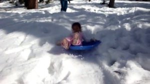 Stephanie sledding.