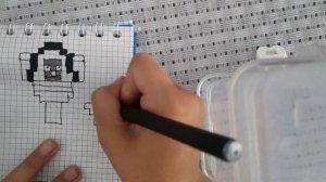 Рисунок по клеточкам Скибиди туалет и камера мен.