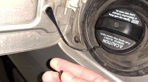 How to replace fuel door spring on a 2005 Lexus RX330