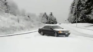 BMW E38 740il Beautiful black classic on snow
