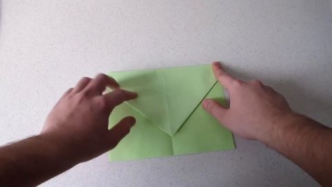 Оригами - классический самолетик из бумаги.