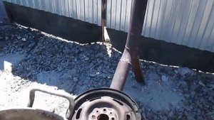 Как сделать печь из автомобильных колес. Печка из колесных дисков.