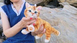 Реалистичная игрушка Котенок