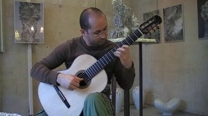 El Coqui - Jose Quinton, Emil Petrov playing a guitar by Philipp Neumann