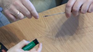 Снять кольцо с удилища и не сломать его