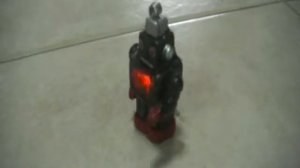 Miniature Wind up Tin Toy Sparkling Robot