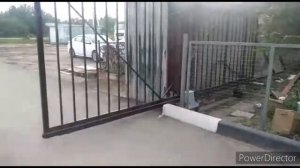откатные ворота  из профиля+калитка с электрическим замком.