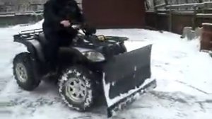 Чистка снега на квадроцикле Stels 500 K