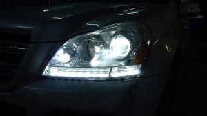GL X164 установка ДХО и светодиодных линз Оптима проф сери  ДХО с поворотником
