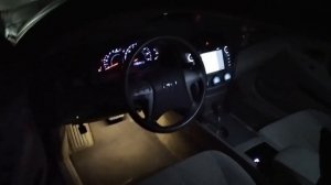 Подсветка пространства ног переднего пассажира и водителя. Toyota Camry 40 LE.