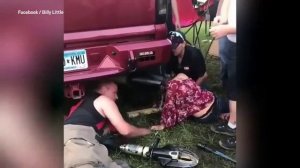 Girl manages to get head stuck in truck's tailpipe