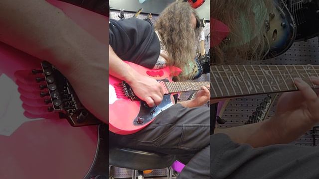 Guitar Center playing a pink Ibanez JEMJRSP Steve Vai Signature guitar смотреть онлайн