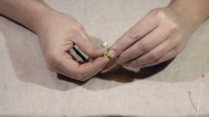 Кивок (сторожок) из пружины от рулетки.