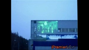 Лазерная проекция на фасад здания днем