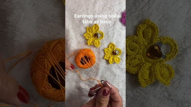 Earrings using soda tabs as base.  #crochet #crochetedearrings #hobbies #craft #momshiebrends