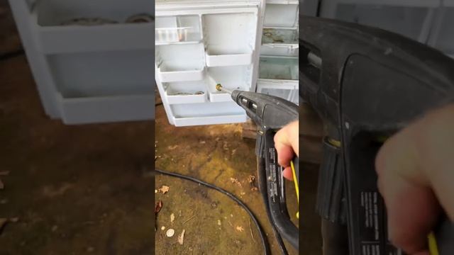 Pressure washing the refrigerator