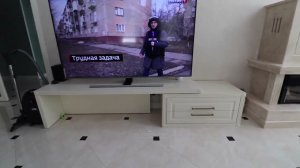 Поворотная тумба под ТВ в гостиную