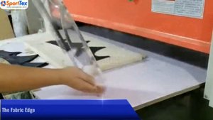 Станок для нанесения клея на ткань.