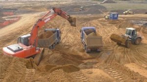 Погрузка самосвалов Scania экскаватором Hitachi Zaxis 200 и погрузчиком Liebherr L534