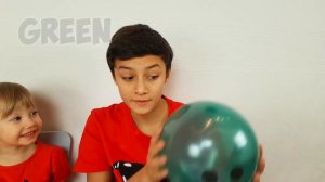 Alena and Pasha plays with balloons in school