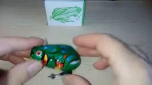 Игрушка заводная лягушка попрыгушка