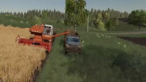 Разгрузка комбайна и доставка урожая на элеватор с помощью «AutoDrive» для Farming Simulator 19.