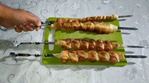 105. Сосиски в тесте на мангале.