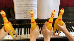 Rick Roll But Rubber Chickens Play It on the Piano