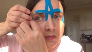 Тейпирование гусиных лапок