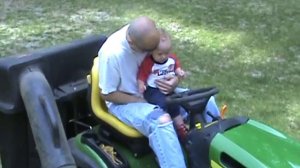 Mowing the Lawn with Daddy June 09