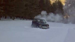 Нива в снегу на шинах Кама И-511 шипы